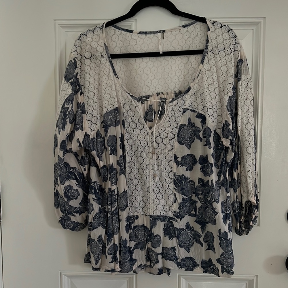 Free People size small. Cream and blue floral with cream lace.